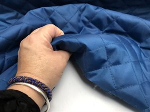 Fastvævet quiltet foer/yderstof - jeansblå